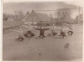 ASH833 school children in field by school includes Peter Ash